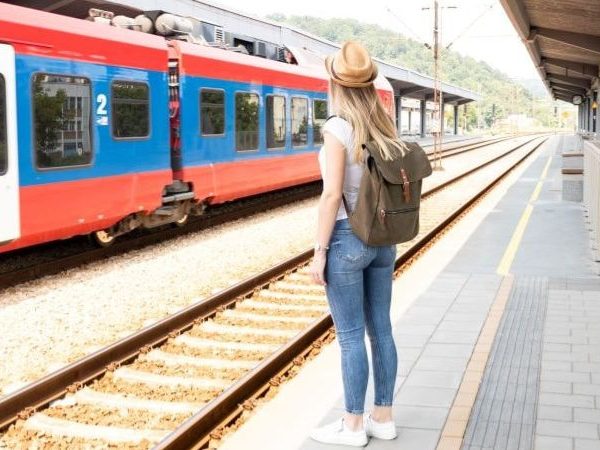 traveller woman train station